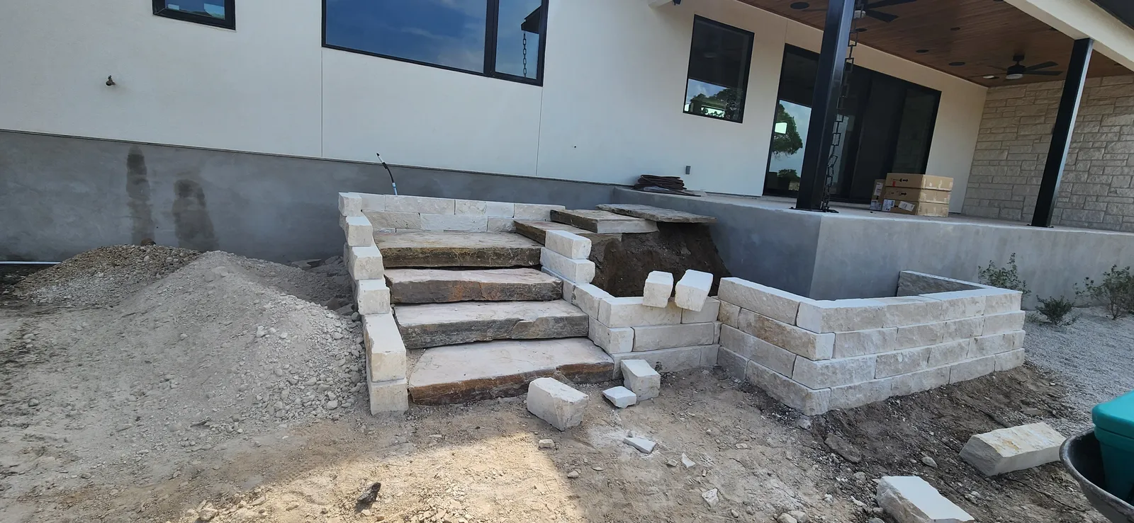 Masonry steps and wall project in progress