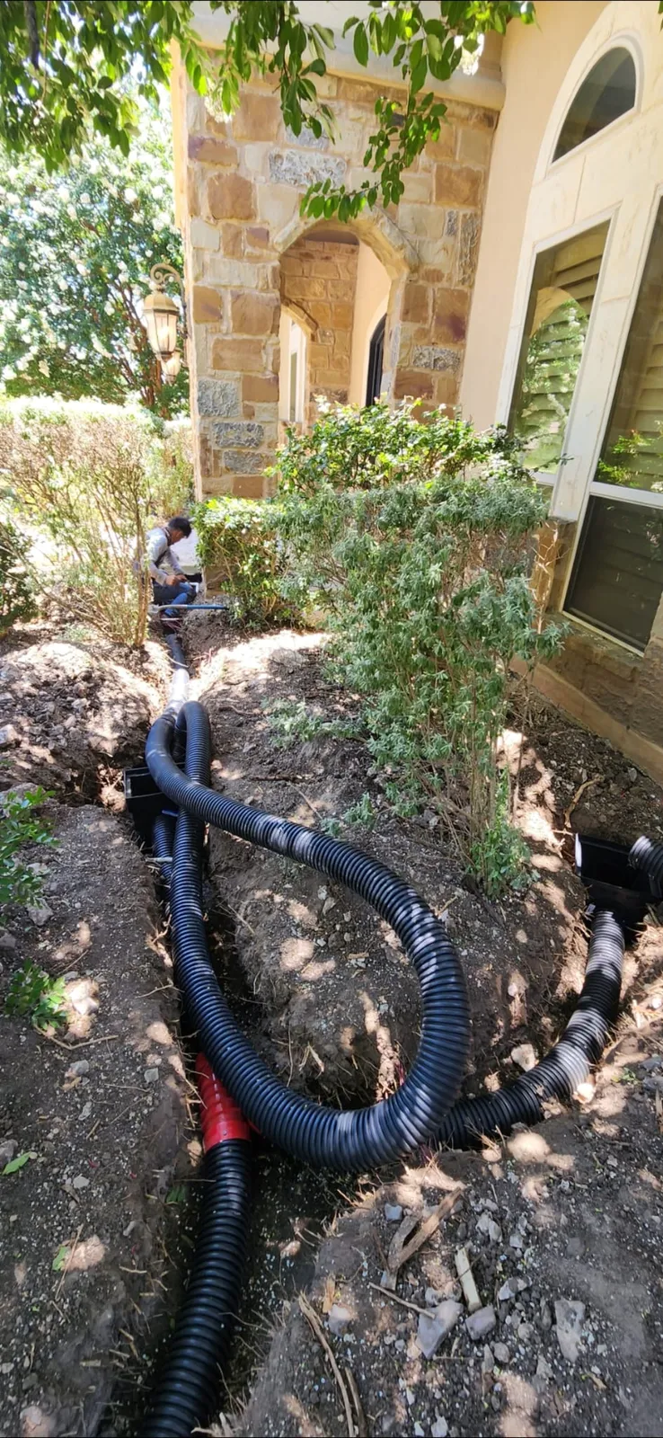 Drainage installation in a shaded garden